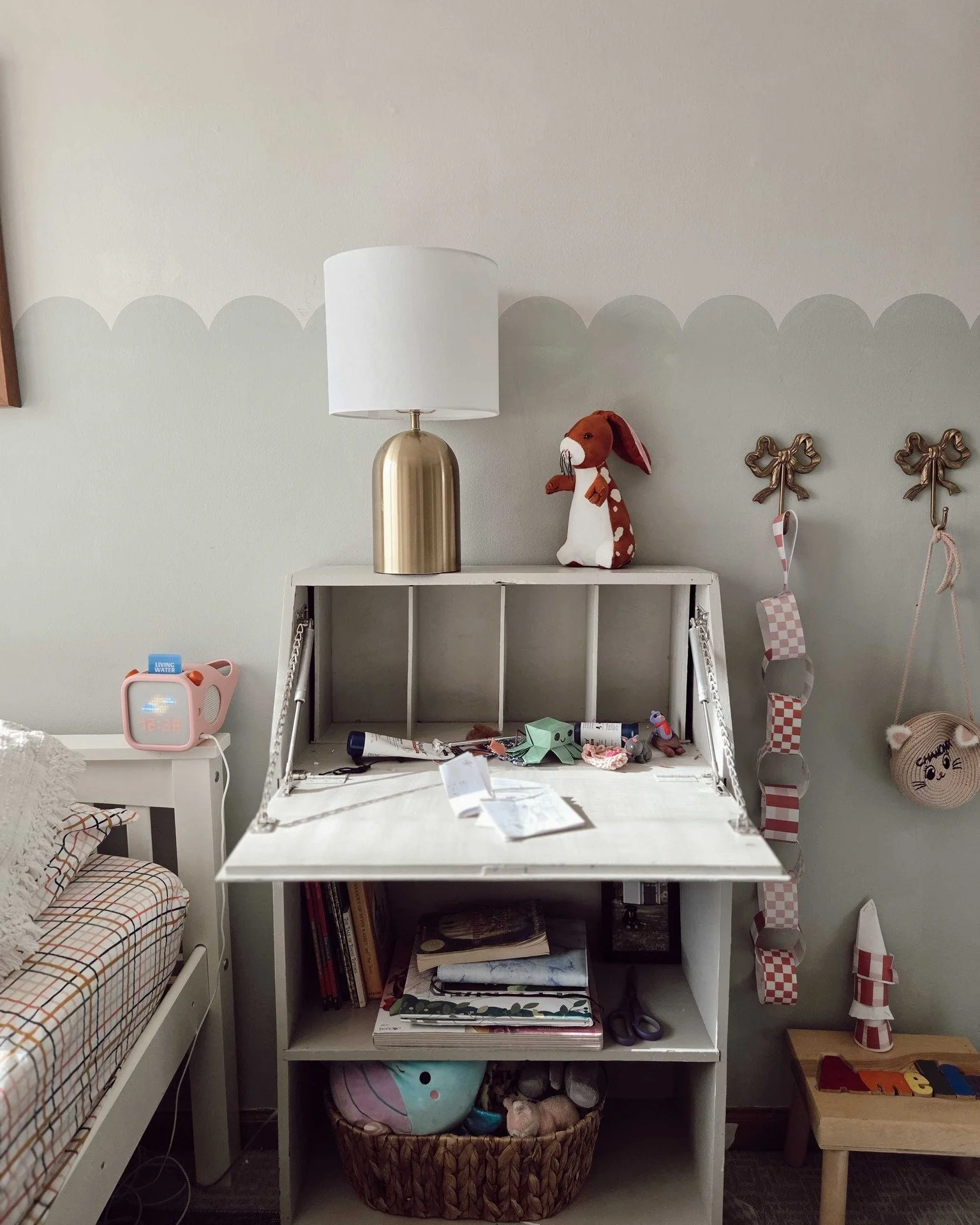 In a luteal cleaning rage, a big black trash bag and vacuum accompany me around the house. I square up to my daughter's little secretary desk in her room. At first glance, I see clutter. But as I look to see what I should clean up first, I freeze&nda