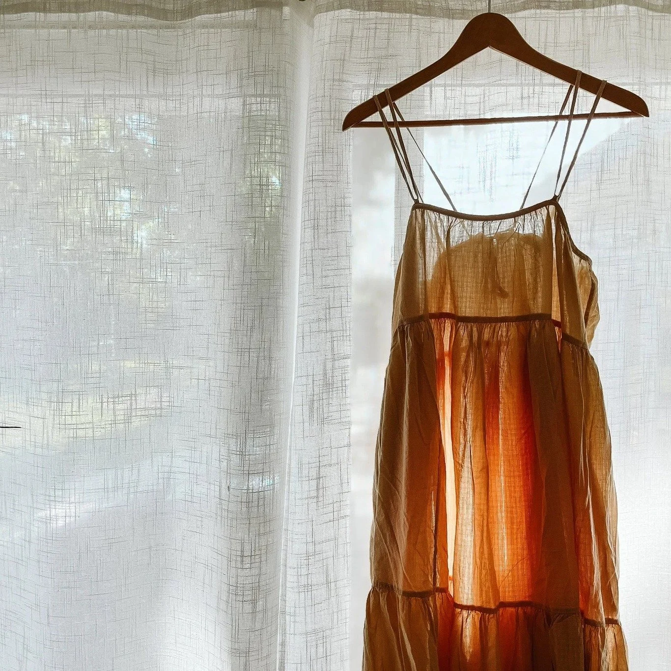 I wear stains more than I wear smiles.
Like a smock that mocks, 
motherhood makes a mess of me.
I wake, I stretch long limbs,
I hurl hurry into the humble faces before me, and
I dress in all my discontent:
I slip on socks of sorrow,
put on pants with