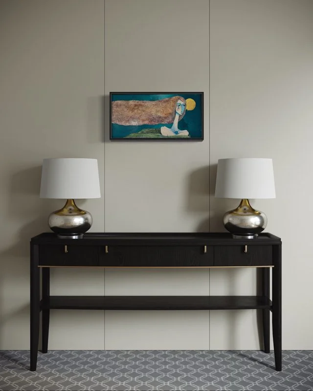 surreal painting of a pale, long-necked woman with blue eyes and pink cheeks. brown hair, collaged with antique teller logs extends horizontally above green forms with a gold circle behind her on teal