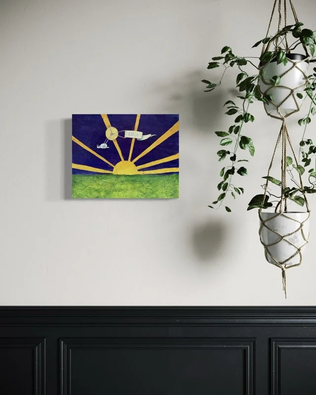 A yellow sun rises over a green, map-like landscape with golden rays. A snail pulls a banner reading AHIA. Features watercolor and collage pieces of aeronautical maps layered with ink wash