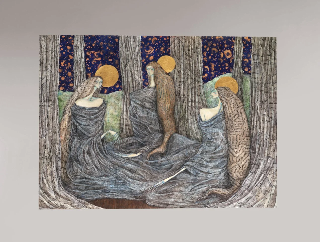 Three figures in draped gowns sit among tall trees. Each has a gold halo and flowing hair, set against a deep blue night sky with gold stars and moons, creating a mystical collage within the scene.