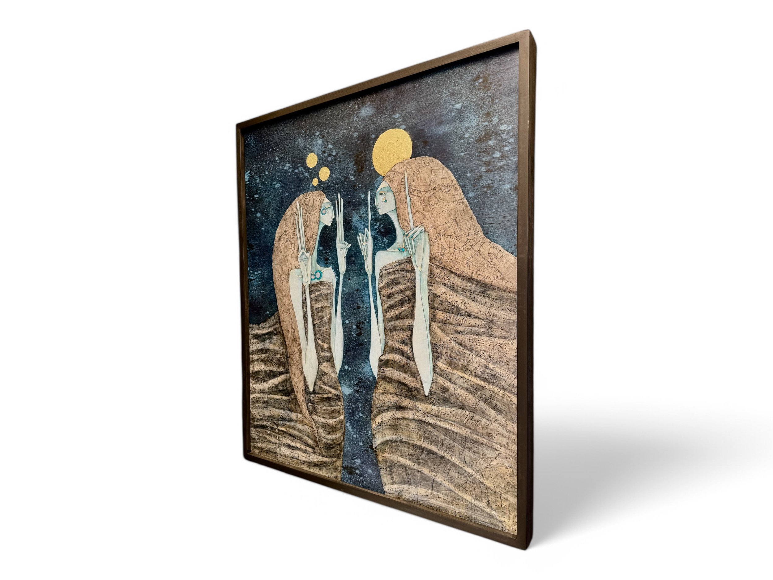 Two tall, slender, blue-skinned figures wrapped in earth-toned cloaks face each other against a dark blue, starry background. Features collaged sheet music & maps layered with ink wash and gold leaf