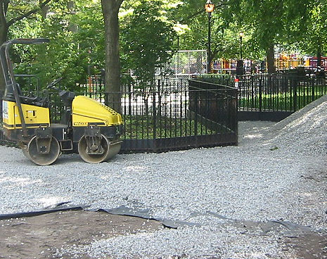The packer will press the stones before a smooth, paw-friendly running surface called "Plymouth Brown Mix" is poured on top.