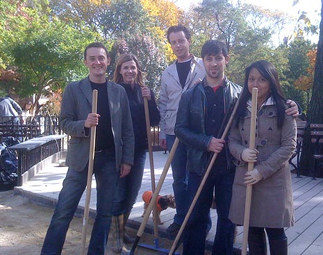 Volunteers in the small dog run pose for a picture