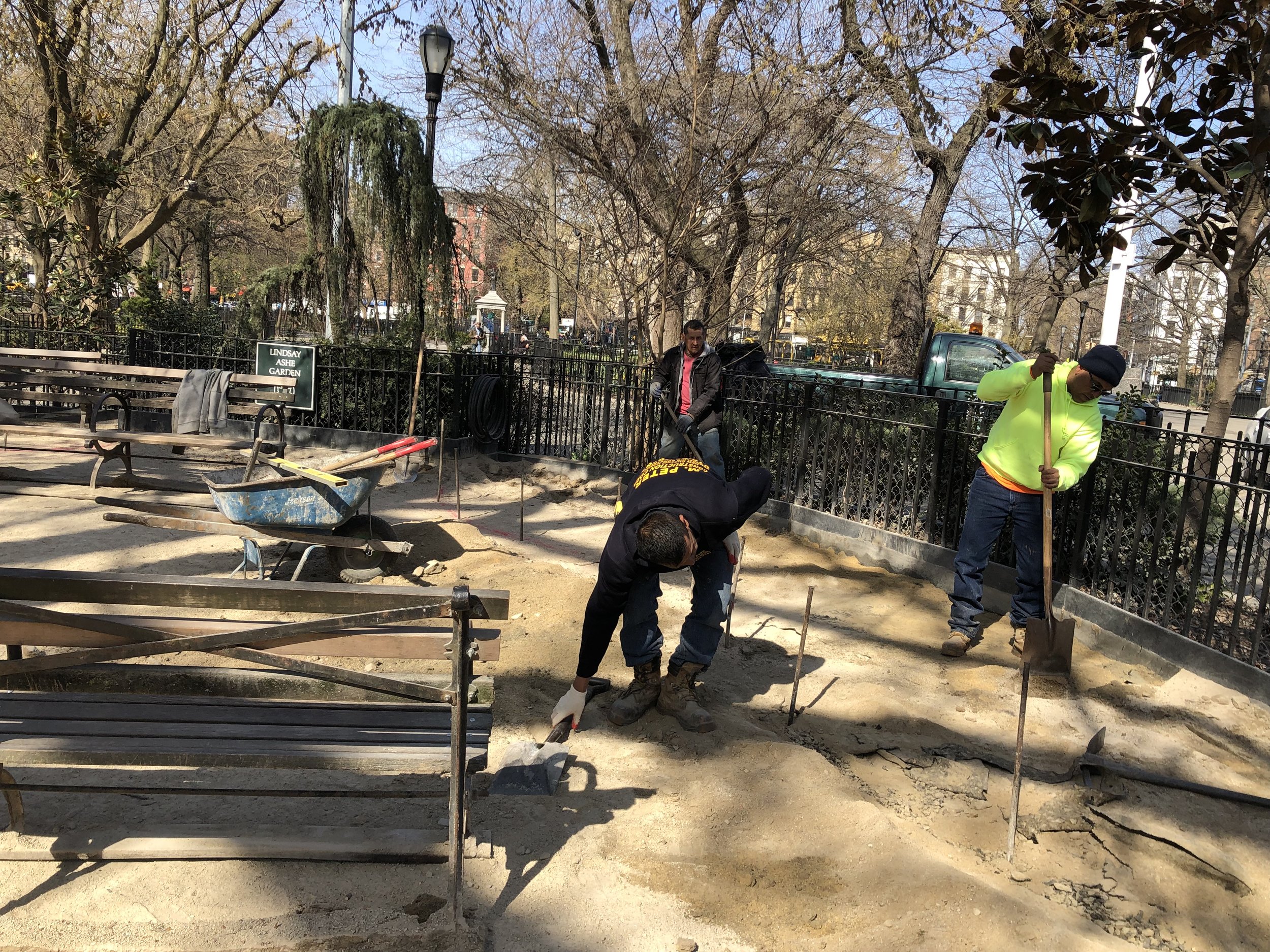 The team excavates the old stone and sand