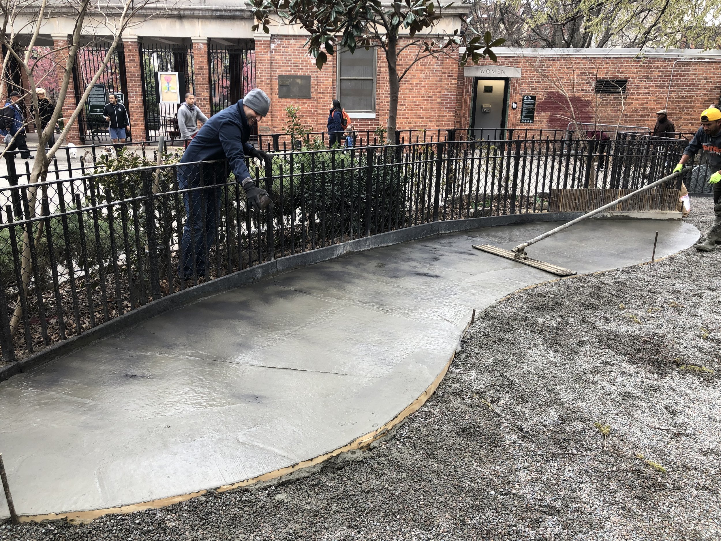 The concrete is leveled, tinted and smoothed