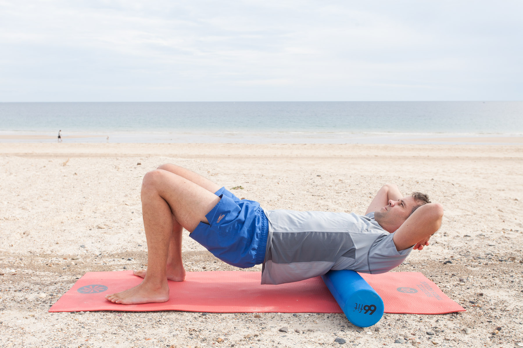 Thoracic Roll Lift your hips up and keep your head supported with your hands. Roll the upper part of your back from the shoulder blades down to the lower ribs. Keep breathing and relax your jaw. You should feel some nice releases in the joints here. Avoid the neck and the lower back. 