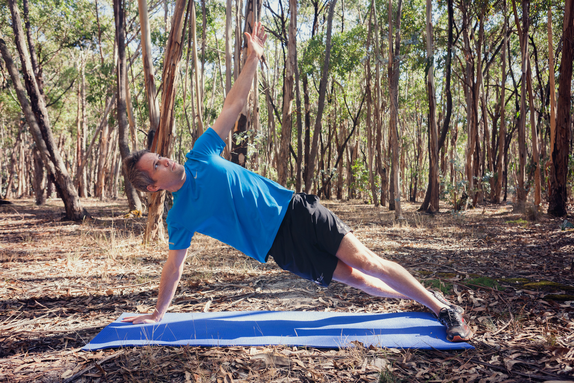 Push yourself up into a plank position with your hands under your shoulders and Perform a half push up. As you're coming up, rotate your body, turning one arm up towards the ceiling. Allow your head and body to follow the movement. Your may rotate a little on the balls of your feet. Return your hand to the floor and repeat on the other side. Repeat x 3 each side.