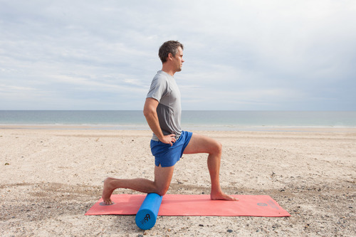Psoas stretch - gently ease into it tucking the pelvis under as you lean forward (Picture credit: Fiona Melder Photography )