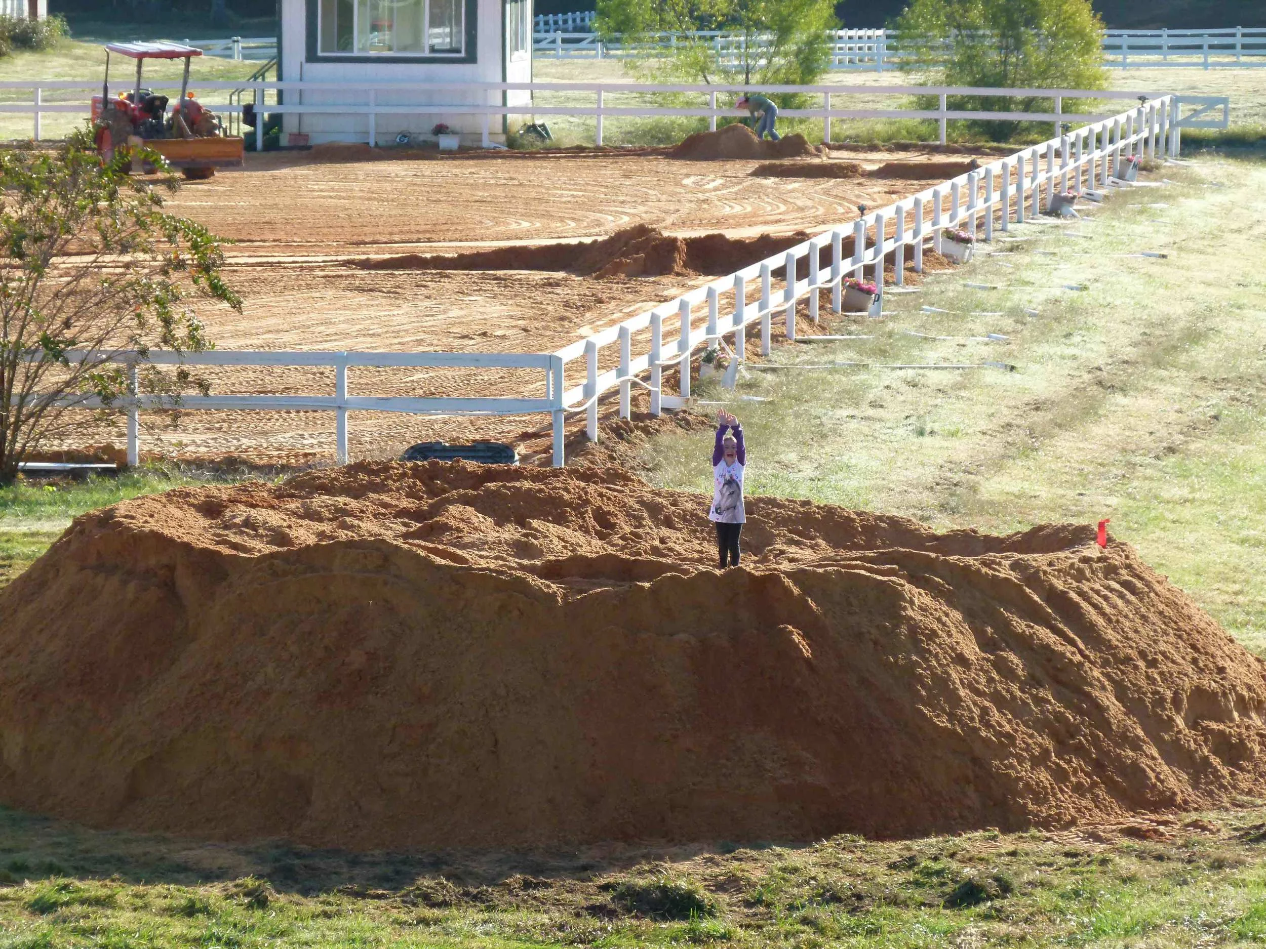 Caitlyn enjoying her new sand box while the arena footing is being redone.