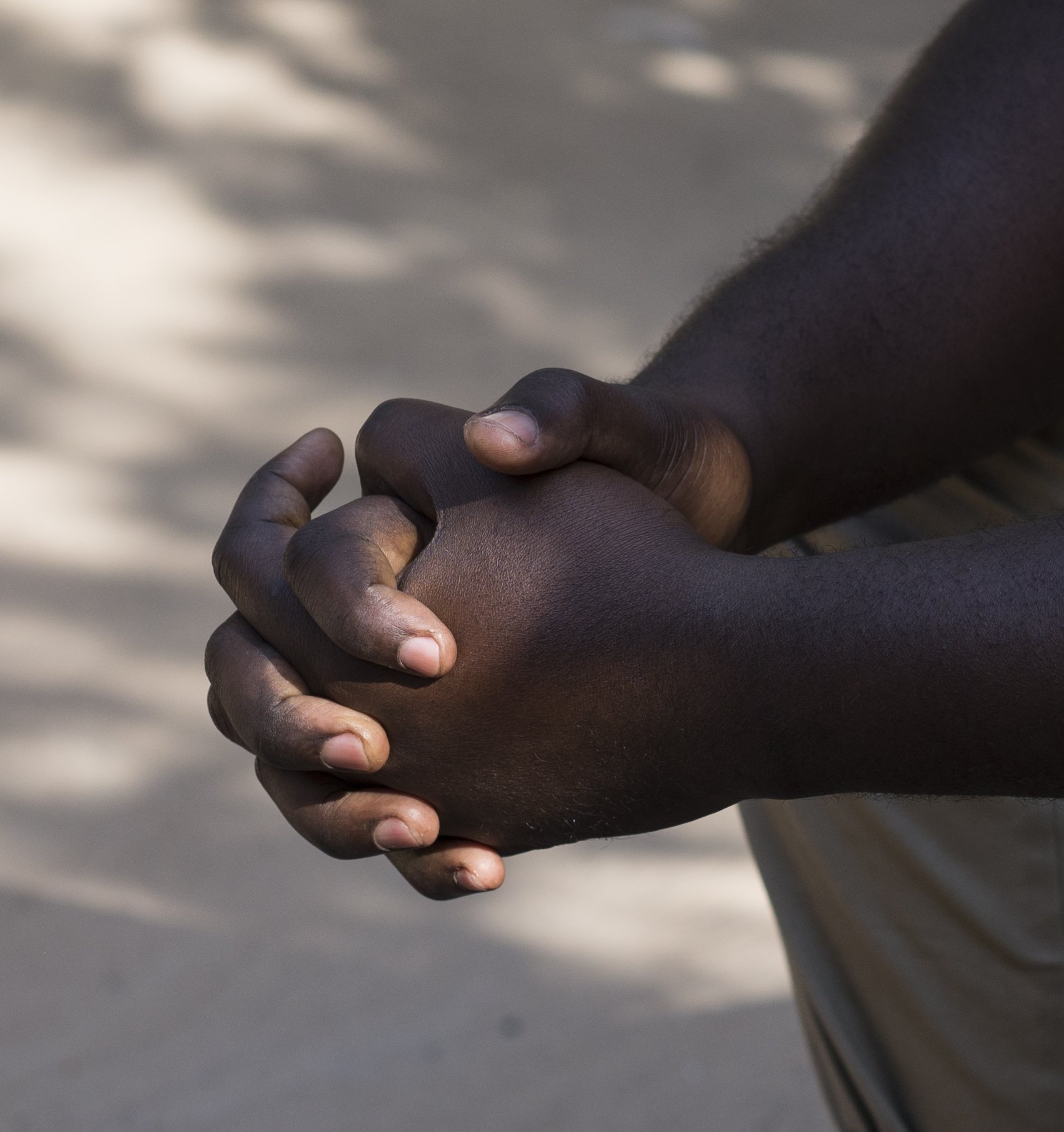 The hands of Modou Ngum