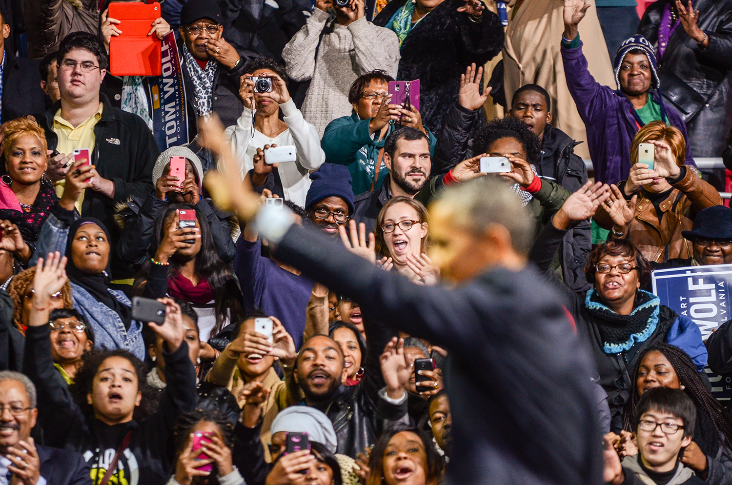 President Barack Obama waves to prospective voters at a rally for Tom Wolf at the Liacouras Center on Nov. 2.