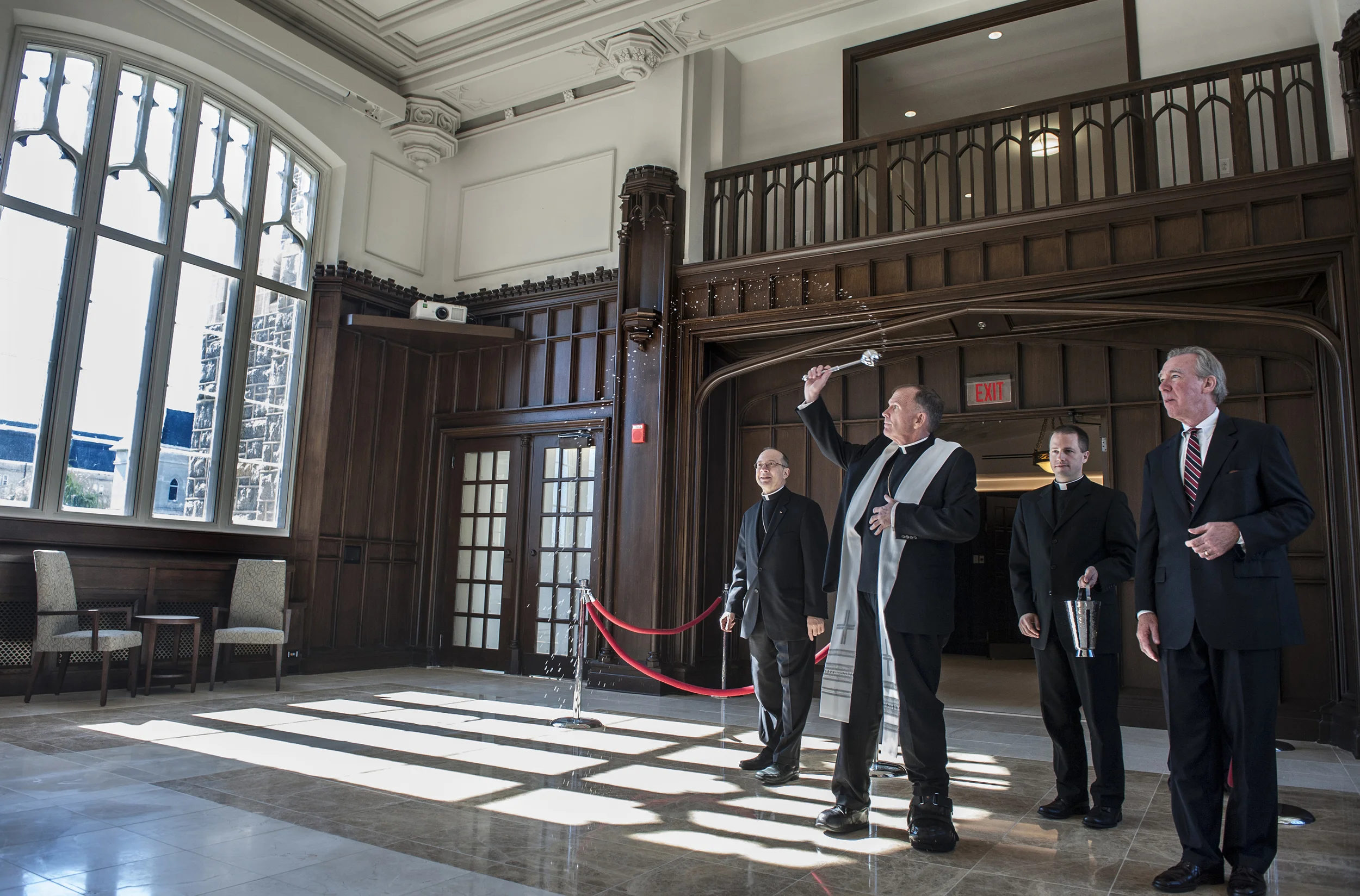 Bishop David M O'Connell of Trenton blesses Heritage Hall during a dedication ceremony of the newly restored Father O'Connell Hall named in his honor. The former president of The Catholic University of America remarked "My friends, thank you for doing this while I am alive."