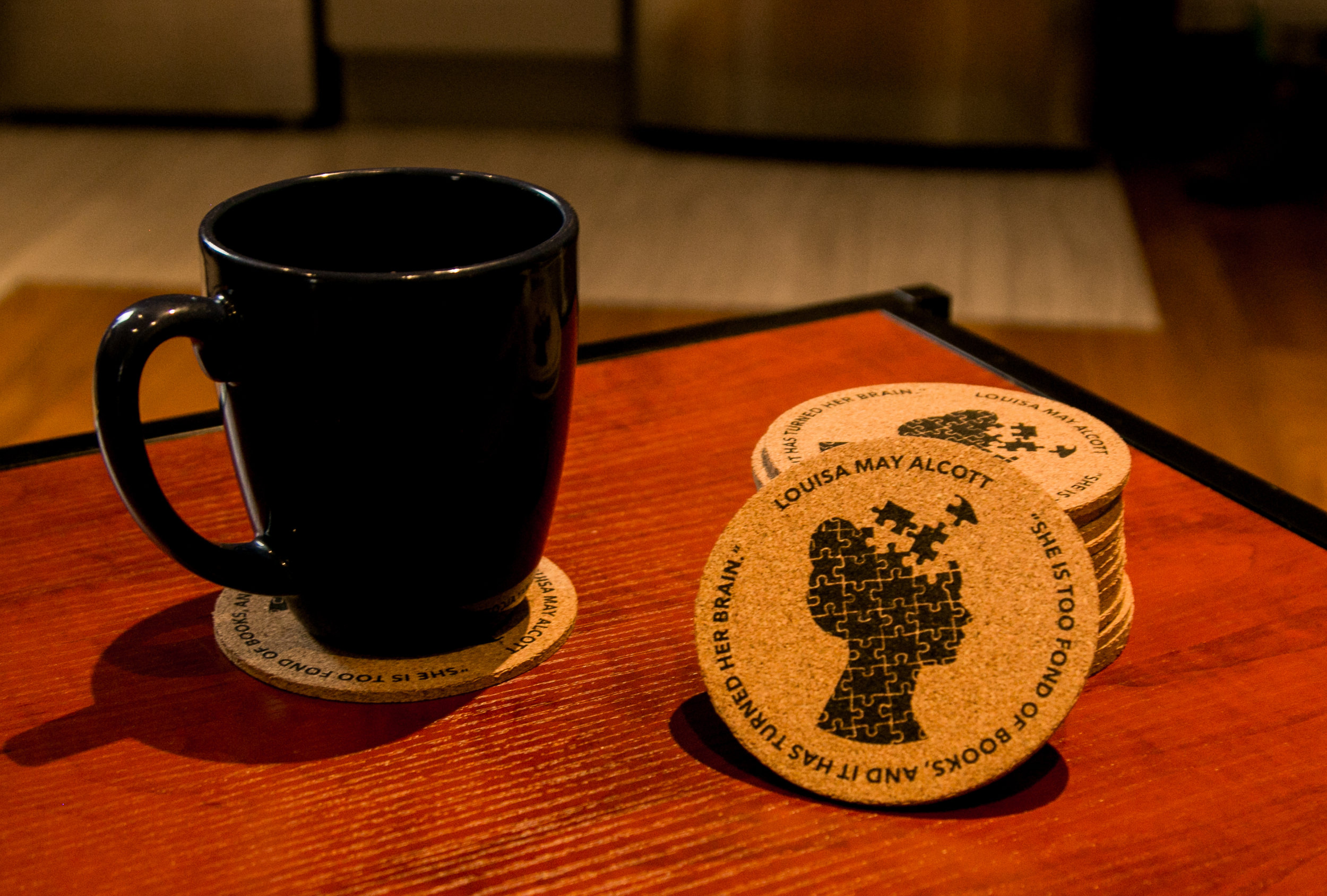Norton's appreciation for literary geniuses can be clearly seen in their choice of merchandise. Given five quotes from different authors, I was asked to interpret the quotes and illustrate visual representations to be placed onto cork coasters. Above: "She is too fond of books, and it has turned her brain." - Louisa May Alcott