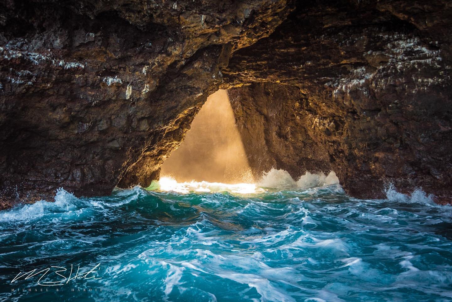 ENTER IN // This open ceiling cave in Kauai, off the Napali Coast is a gateway to other-worldly beauty. Countless hours were spent staring at this image and wondering how I was able to capture it.  The sea was very rough, the boat was rocking like cr