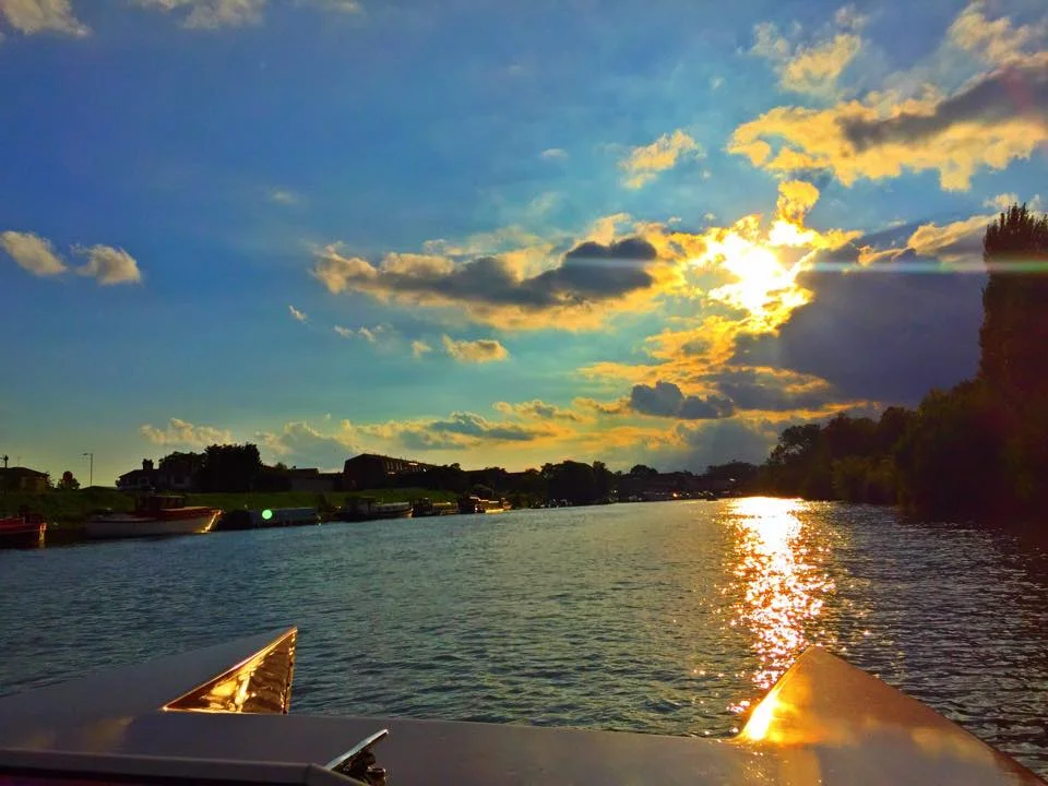 early evening boating toward Hampton Court.jpg