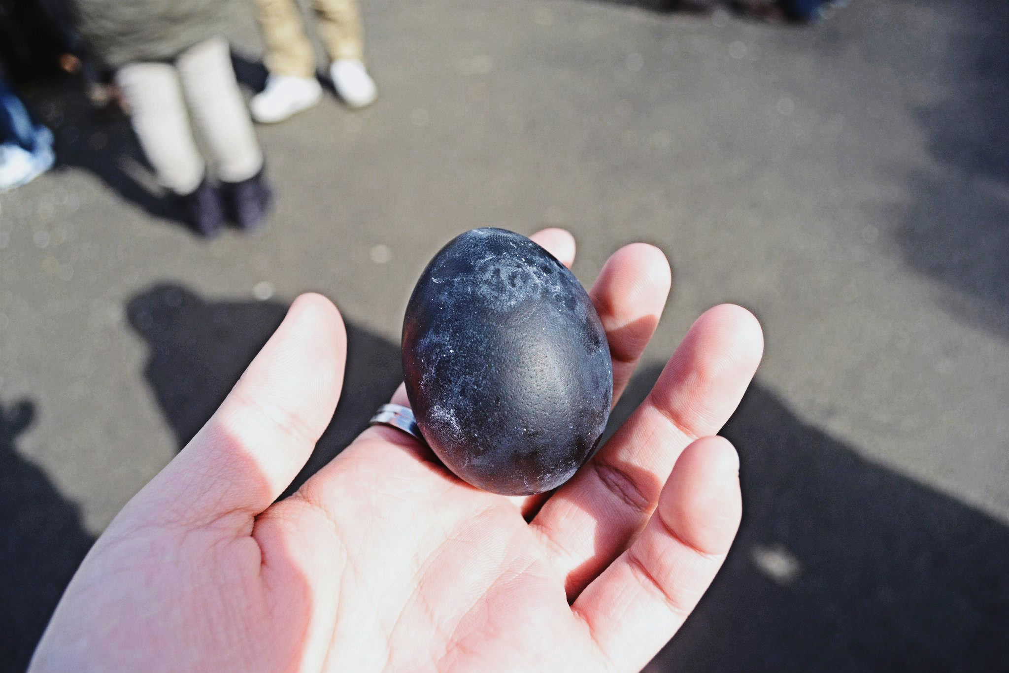 The final result: Black eggs ready to eat. They give you salt to dip it in.