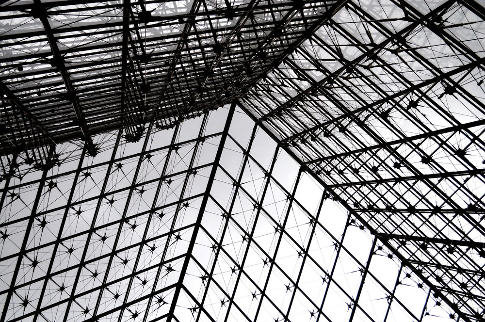 Looking up at the pyramid from inside The Louvre