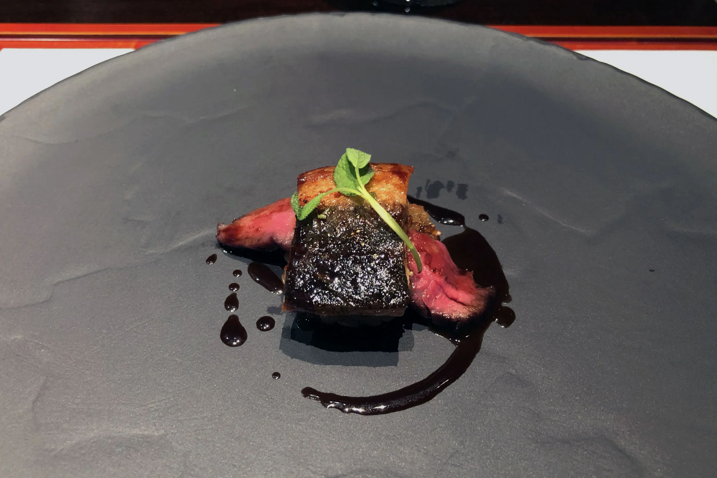 Hitsumabushi unagi and A5 Takanokuni Wagyu on crispy risotto in red wine sauce
