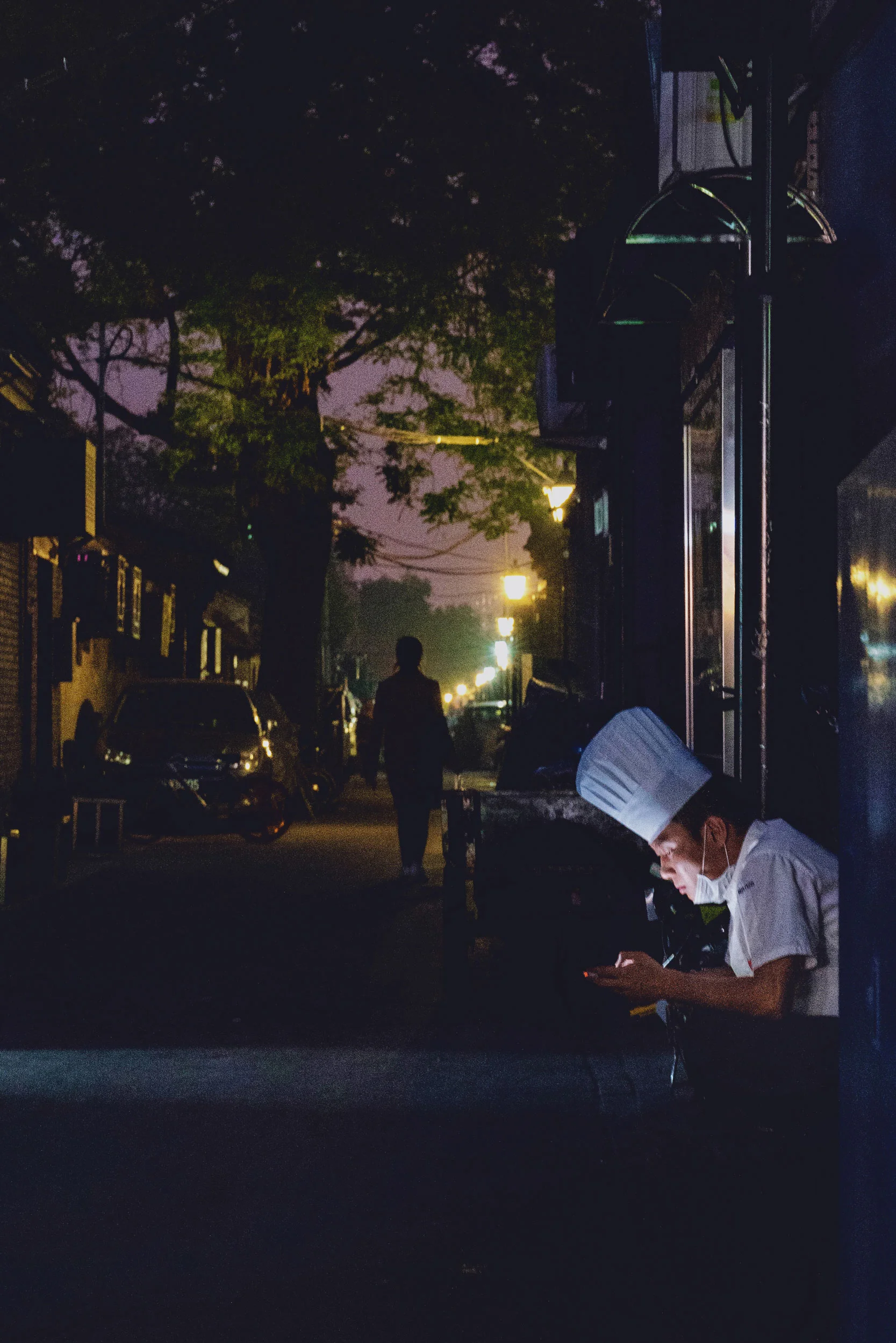 A worker goes on break at Luogu Lane.