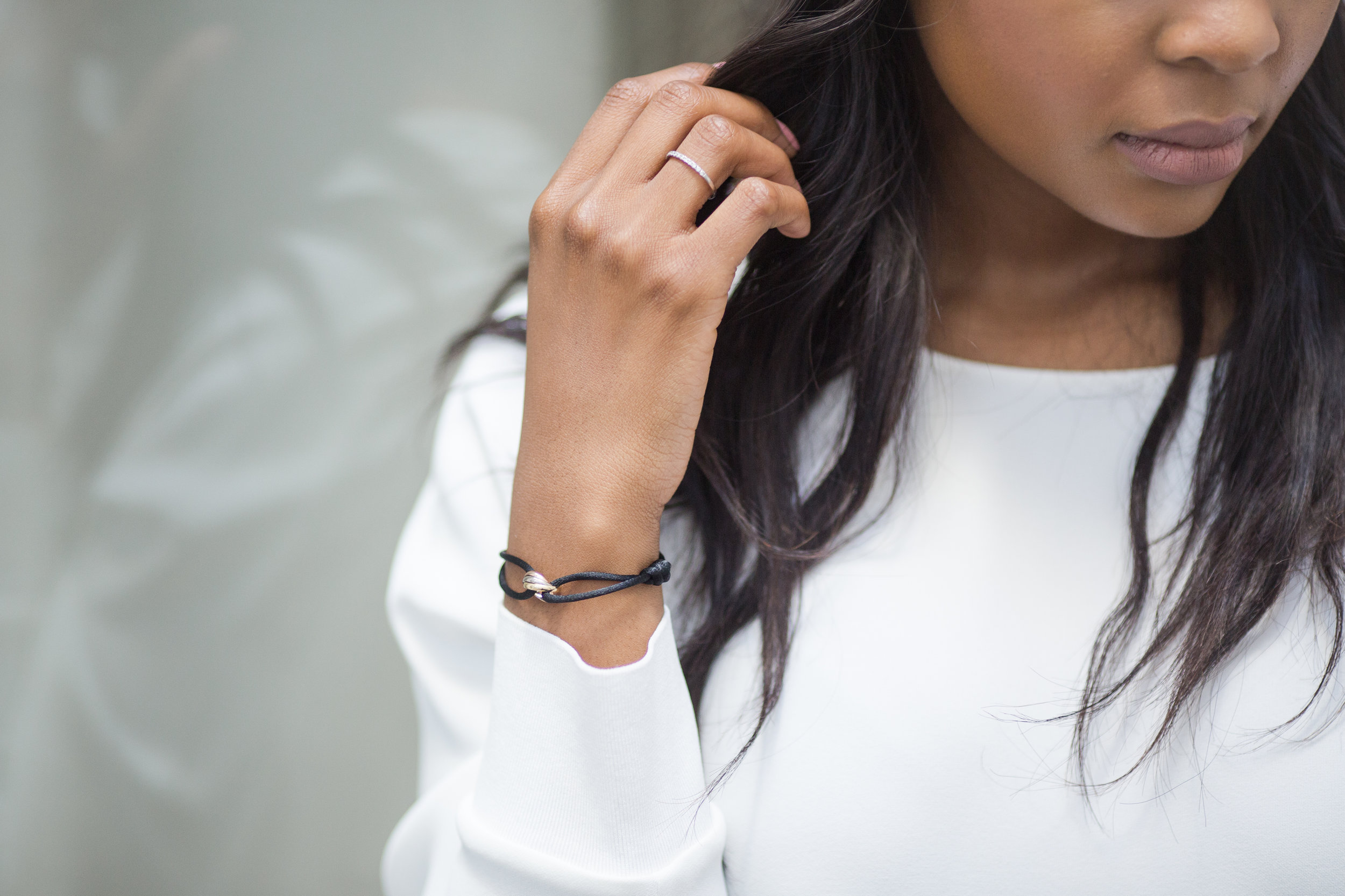 cartier trinity black string bracelet