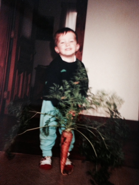 Jamie (age 2) with a carrot. 