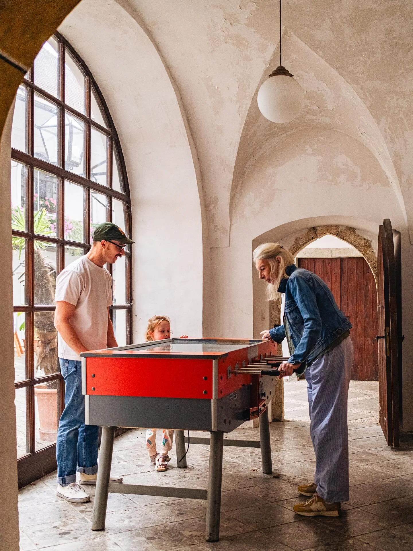 Interlude. On our drive up to Lake Bled, we stopped for a coffee in the town of Radovljica and discovered an fusbol table inside of a church courtyard where I proceeded to crush everyone&rsquo;s game with my incredible skills.