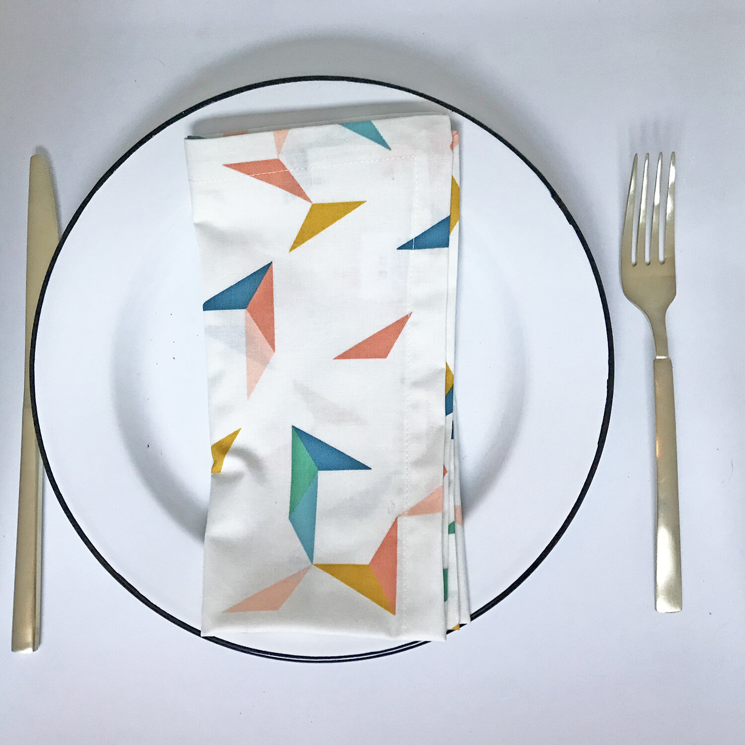 ACUTE NAPKIN PLACE SETTING.jpg