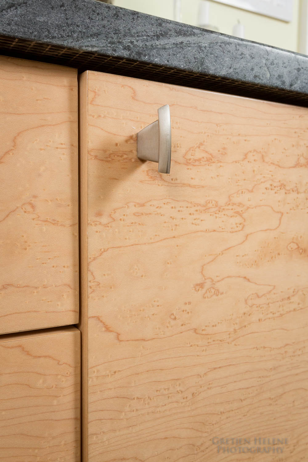 Buffet is crafted from bird's eye maple
