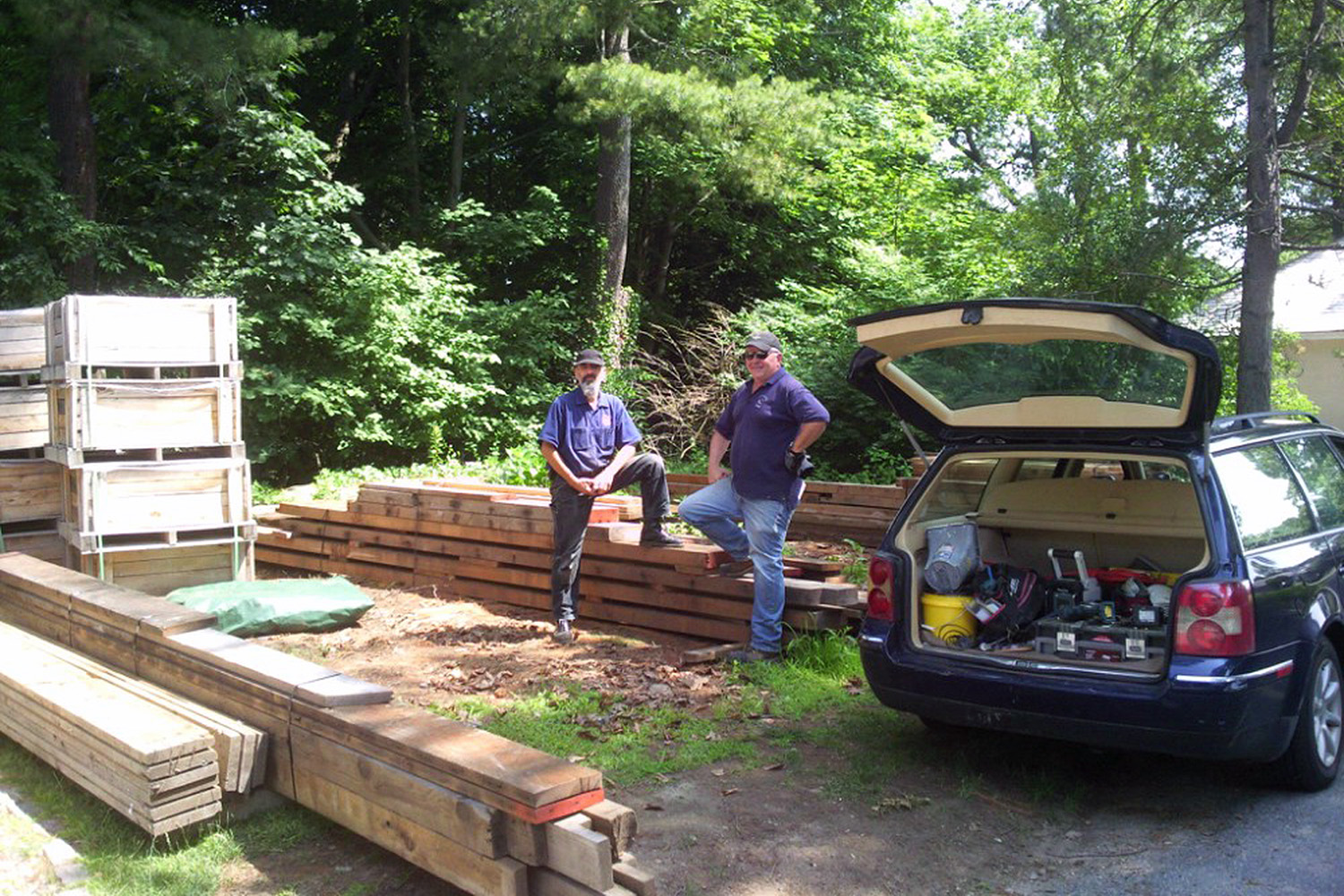Paul and Greg prep lumber for transport