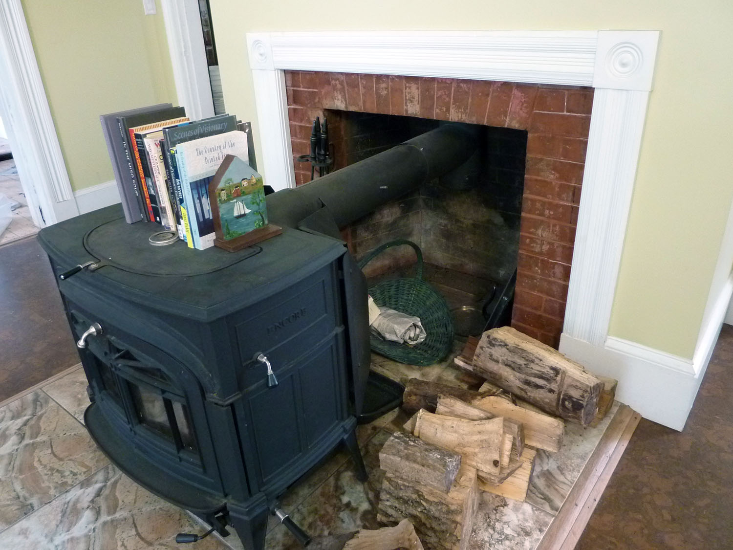 Casing from the house was reused to trim around the fireplace.