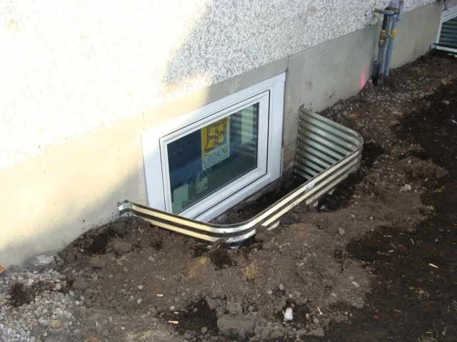 Window wells like this can be a point for water from melting snow to enter your basement. Image by Legacy Windows via Flickr Creative Commons.