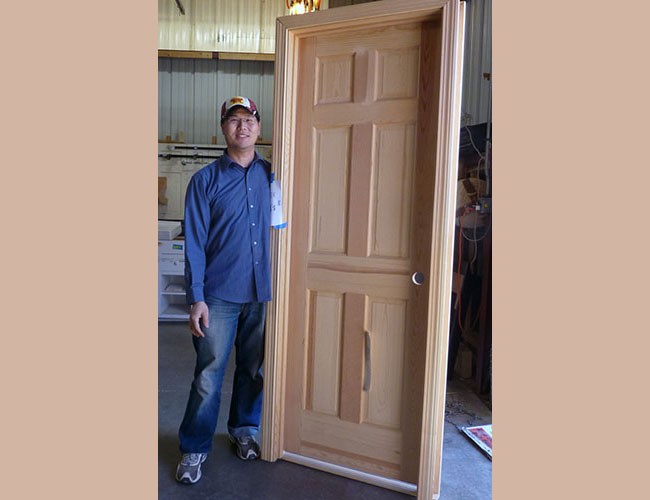 Mission Hill resident Sam Liu picked up two unfinished doors for his home renovation.