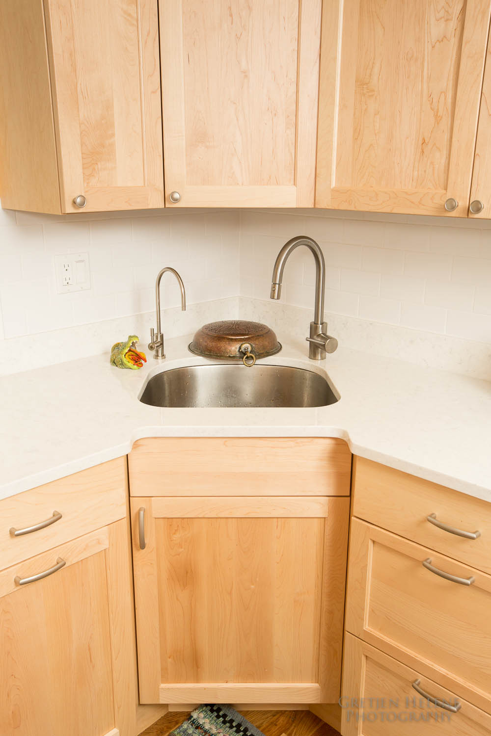 Quartz counter material with an undermount sink