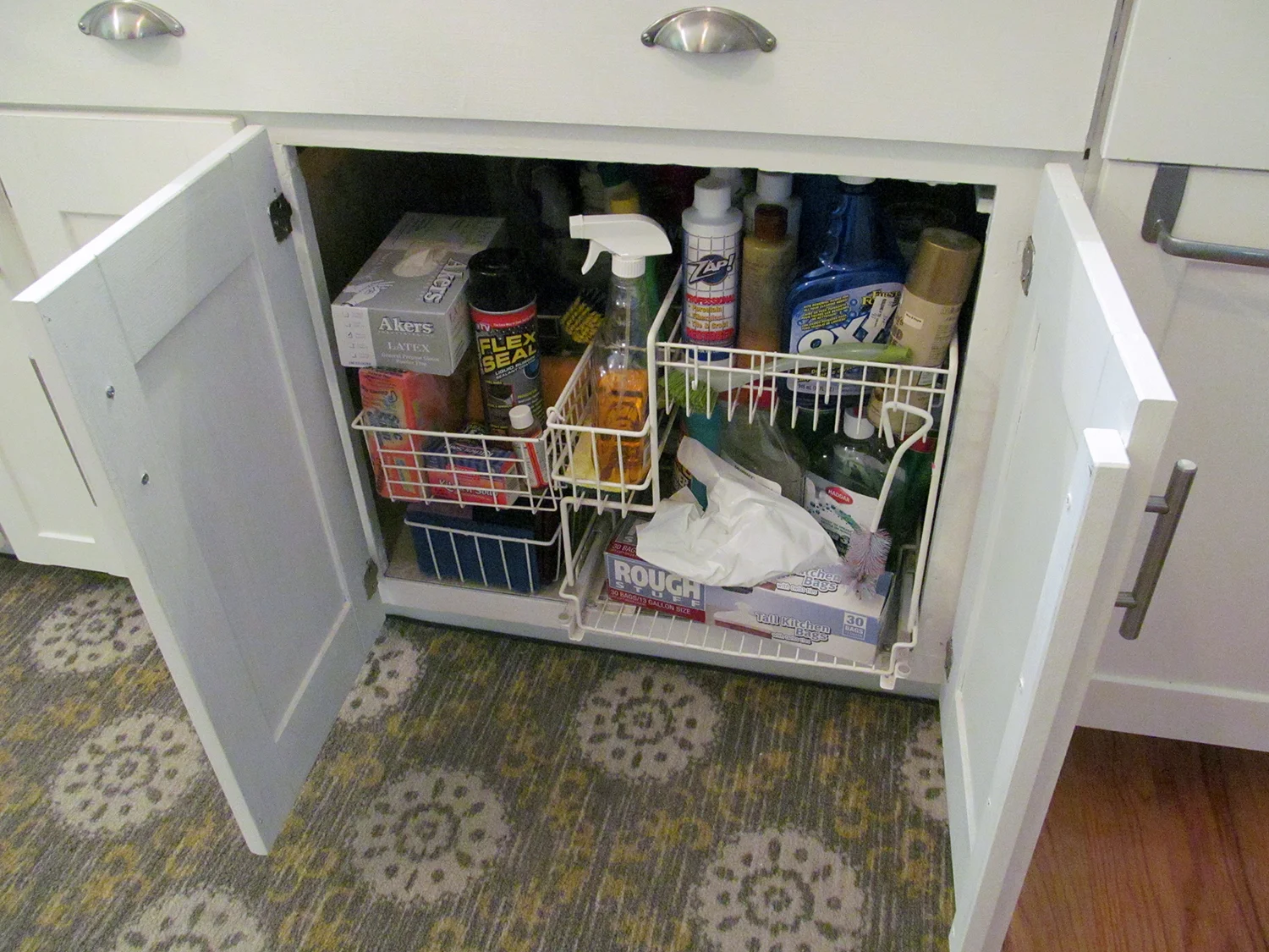 It's not glamorous, but keeping the under-sink area organized sure is useful. Pullout organizers like this can be very expensive, but this one was purchased for just $5.
