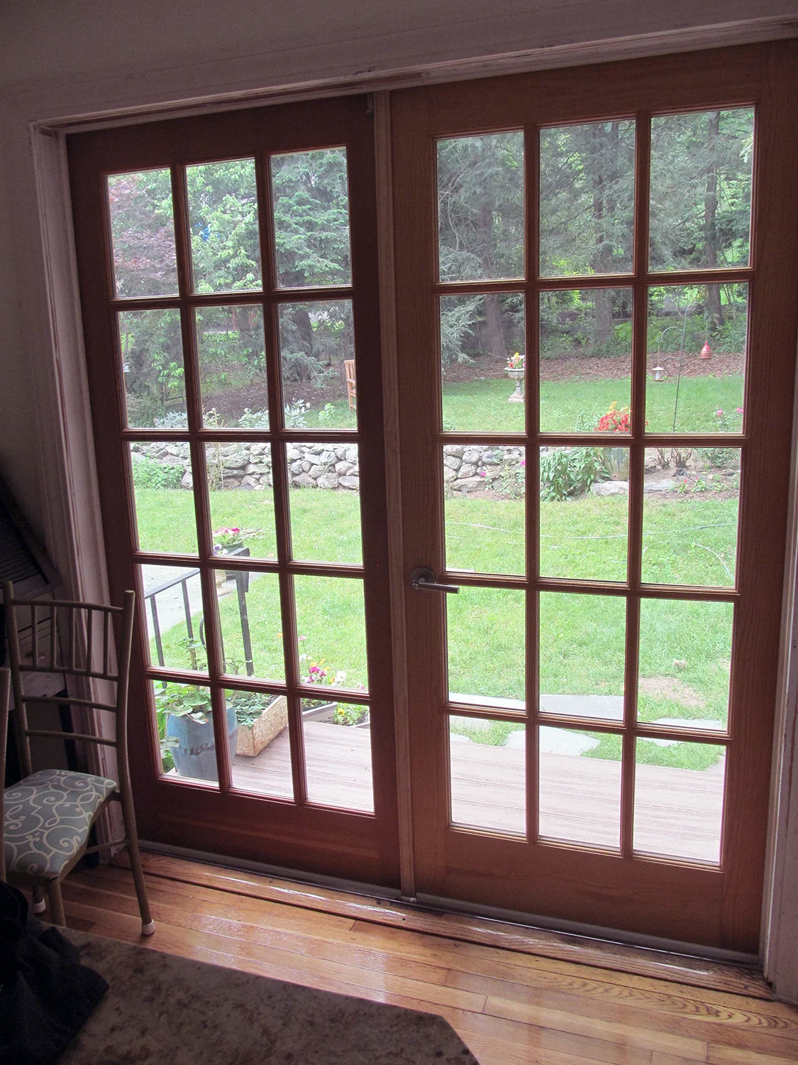 These two exterior French doors weren't designed to work as a pair, but they have been skilfully fit together to let the sun shine in.