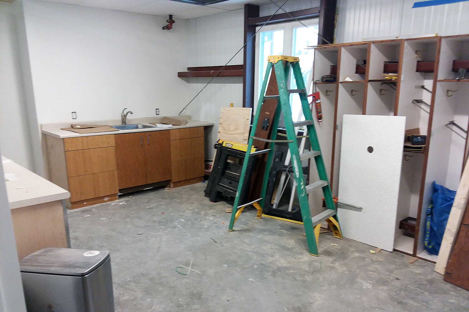 Break room includes donated cabinets and lockers