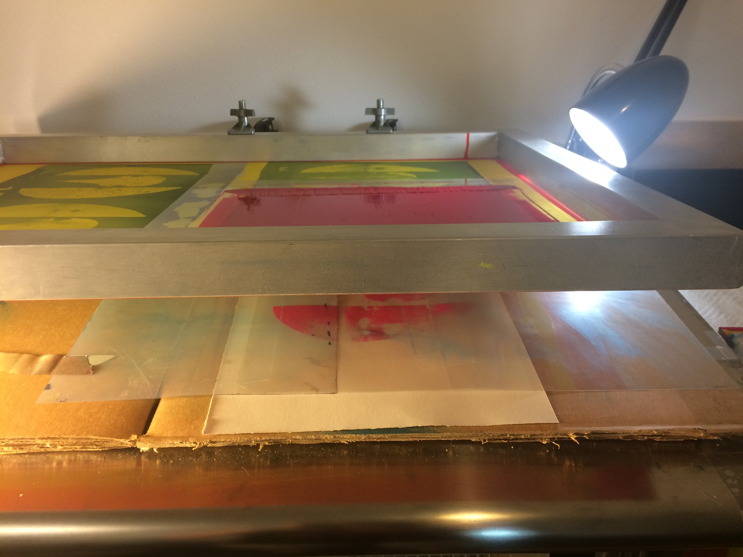 I am getting ready to lay down the magenta layer here, so to (try to) get the registration right I run the ink through once on a blank piece of transparent film.