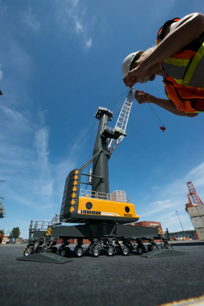 My bigger than life assistant helps position the crane for the shot.
