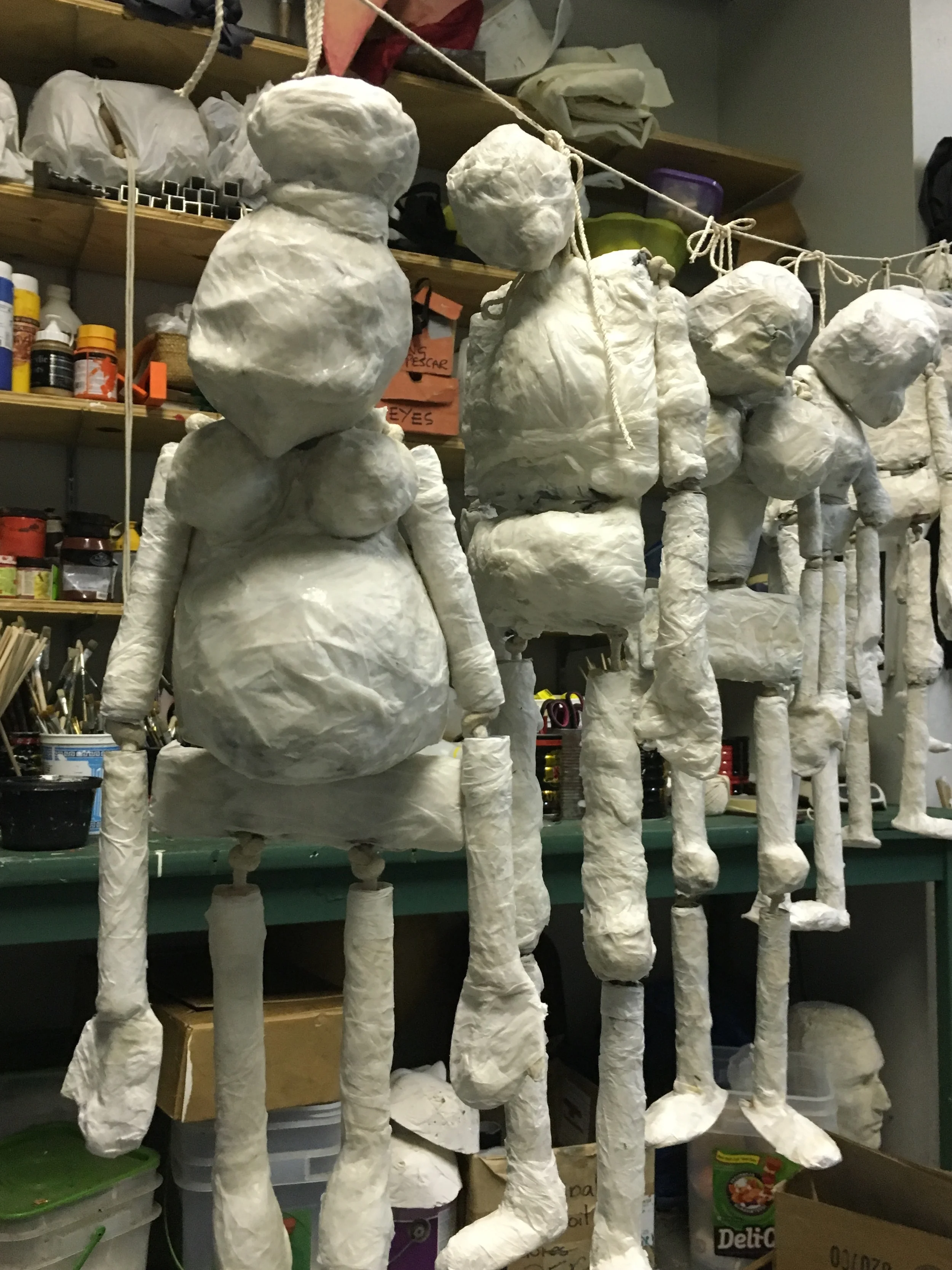 Puppets drying after being papier mached