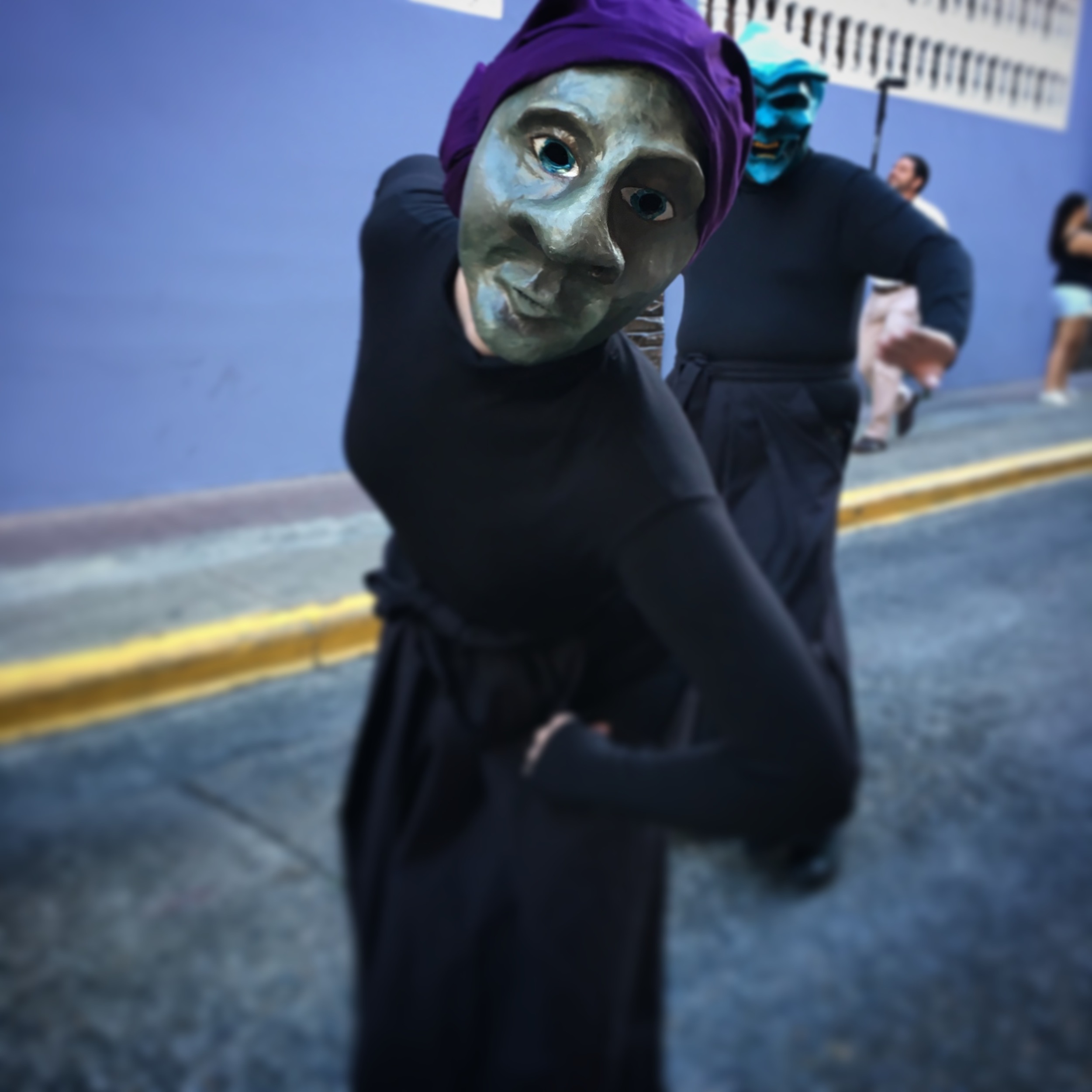 Wearing the mask in the street procession 