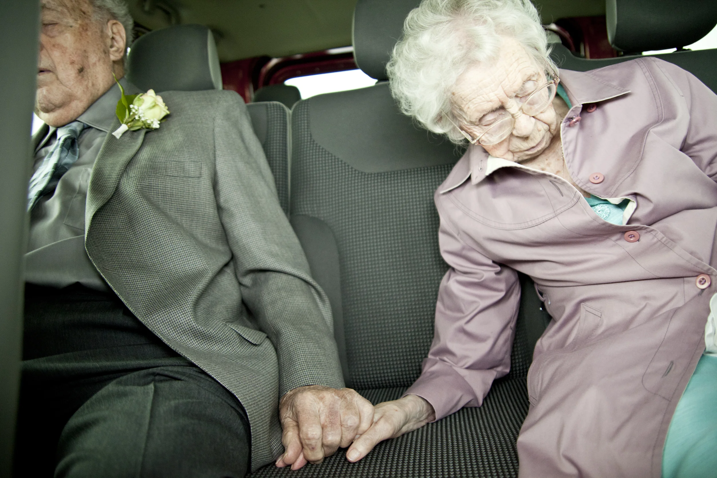 Not the best image in the world, but truly captures the two as a couple. Partying til they drop and holding hands in the process.