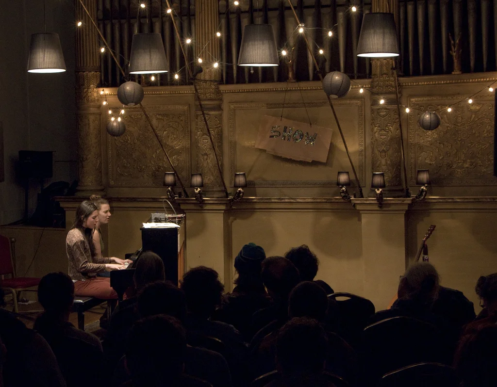 Marianne Rendón singing her song with Victory Gardens at Judson Memorial Church 
