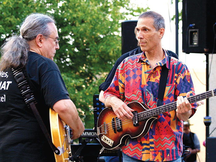 Billy Hallquist, left, and Gary Lopac, right, perform a Dylan tune at a Salute to the Music of Bob Dylan concert Aug. 9, 2014, at Veterans Memorial Amphitheater in St. Louis Park. (Submitted photo by Neil Schloner)