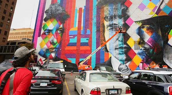 Brazilian artist Eduardo Kobra and his team have worked through the week on a mural showcasing Bob Dylan in downtown Minneapolis, covering up a blank wall on the side of the 15 Building at 15 S. Fifth St. and Hennepin Avenue. (Staff photo: Bill Klotz)