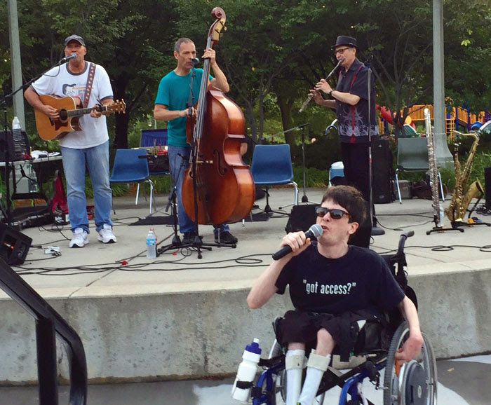 Jeff Dayton, left, performs “Like a Rolling Stone” with other musicians July 23 at Wolfe Park in St. Louis Park. (Submitted photo) 