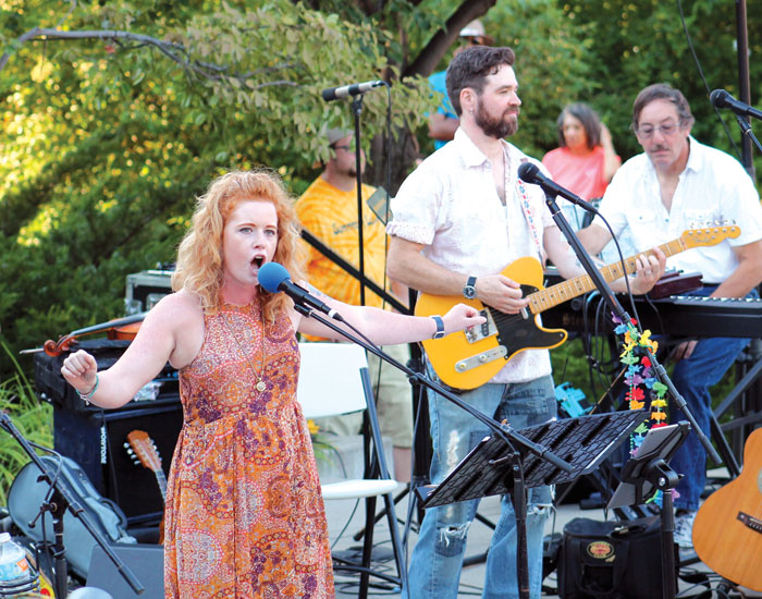  Singer Hailey Woodfill impressed the Summer of Love audience with her versions of “White Rabbit” and “Somebody to Love” at the Summer of Love concert. (Sun Sailor staff photo by Seth Rowe) 