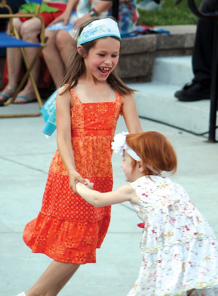 Girls dance during the Summer of Love concert. (Sun Sailor staff photo by Seth Rowe)