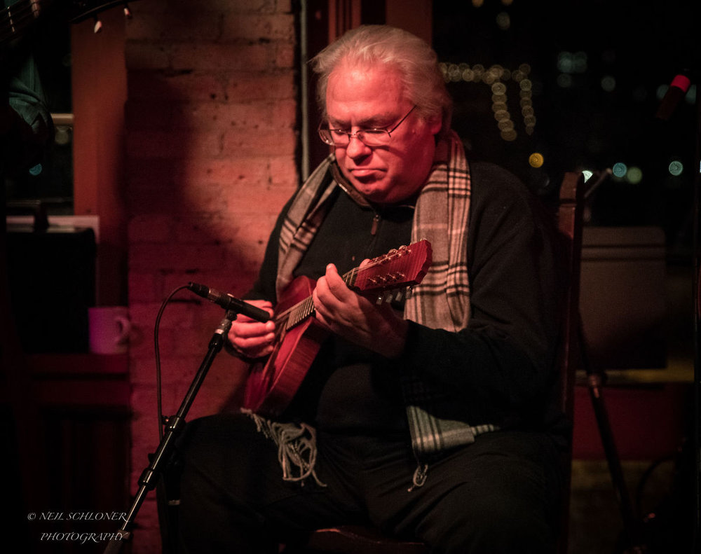  Peter Ostroushko plays the mandolin during Kevin Odegard's "Better Angels" album release show Dec. 5 at the Aster Cafe in Minneapolis. Odegard and Ostroushko have performed in tributes to the music of Bob Dylan in St. Louis Park. They played on Dyla