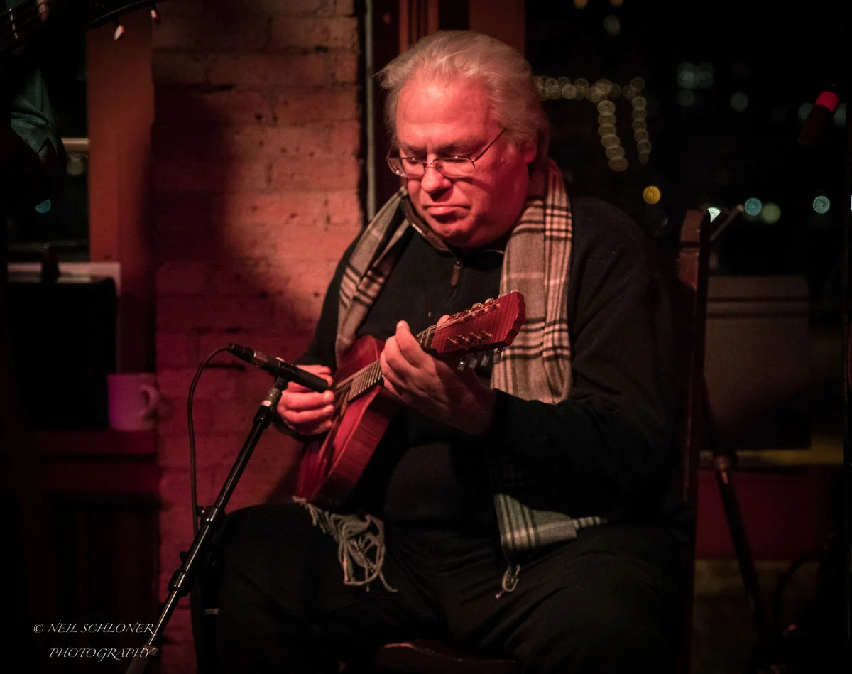 Peter Ostroushko plays the mandolin during Kevin Odegard's "Better Angels" album release show Dec. 5 at the Aster Cafe in Minneapolis. Odegard and Ostroushko have performed in tributes to the music of Bob Dylan in St. Louis Park. They played on Dylan's album "Blood On The Tracks." (Submitted photo courtesy of Neil Schloner)